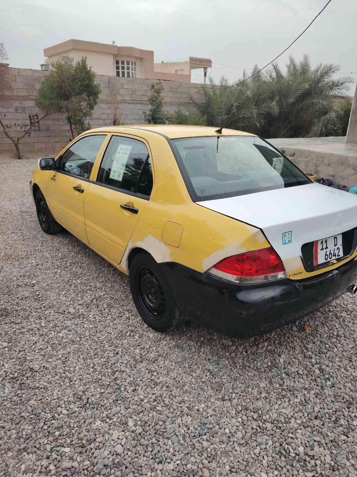 لانسر ٢٠١٠ • مكينة ٢٠٠٠ • ضربة خلفي