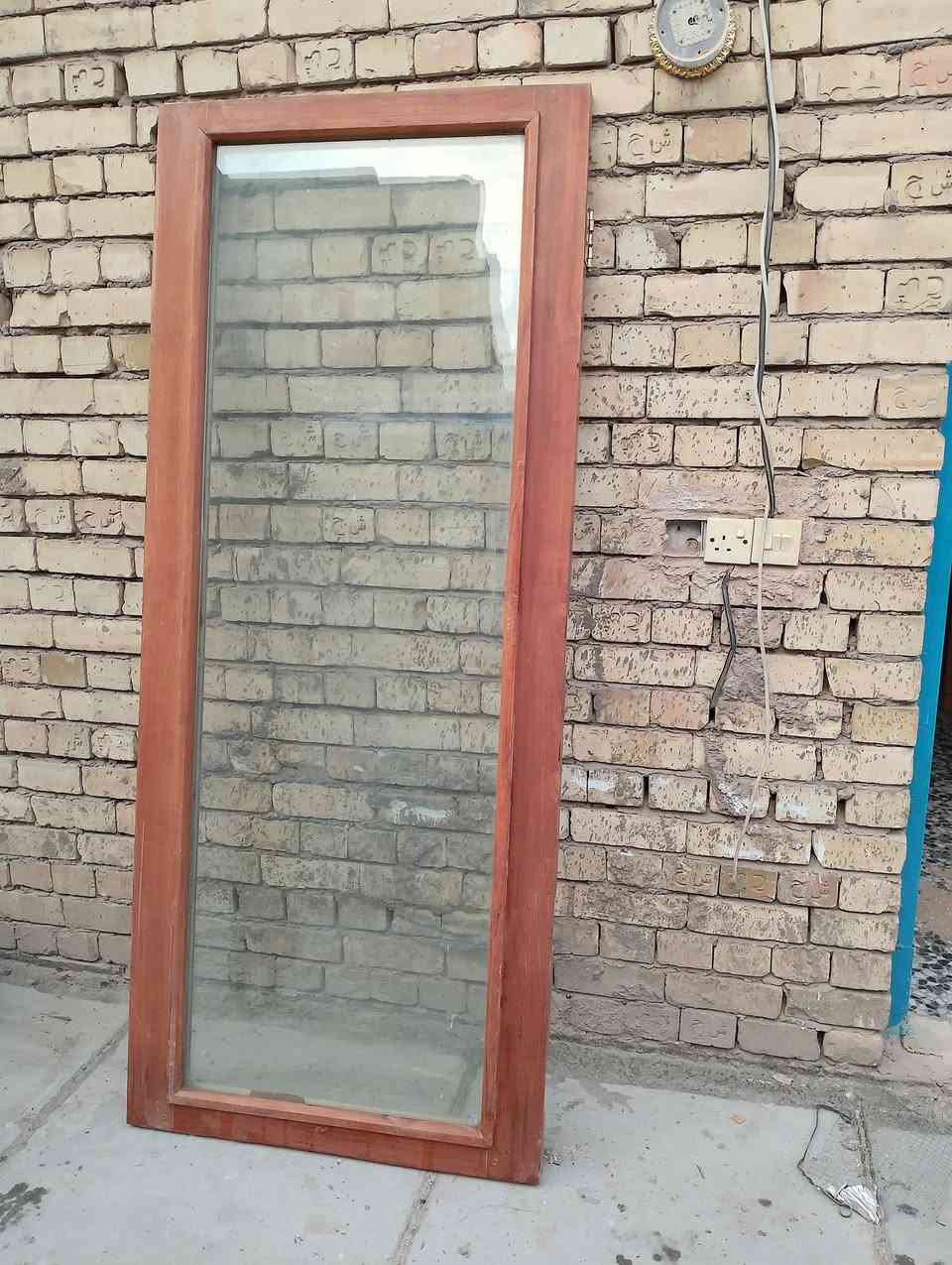 باب خشب • ١٩٩×٨٣ • مدينة الصدر