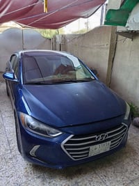 النترا وارد امريكي موديل 2017 رقم بغداد لون نيلي ماشية (95000  ميل وقا...
