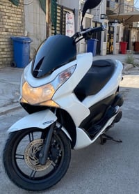 الموشراي لايخابر رجاءً  دراجة pcx ياباني جيل اول  موديلهة 16 جديدة جدا...