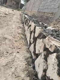 شغل حجر • بناء بيت • بناء سياج