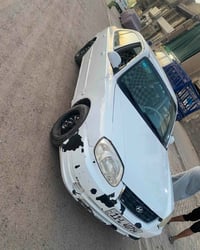 اكسنت فيرنا • ٢٠٠٤ • بغداد