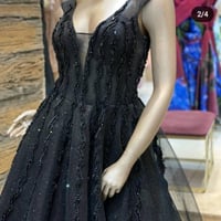 بدلة • قياس ٤٢ • صدر مشغول يدوي