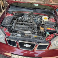 أوبترا 2004 بغداد باسمي كير عادي محرك جديد حاوية تبريد منظومة كاملة جد...