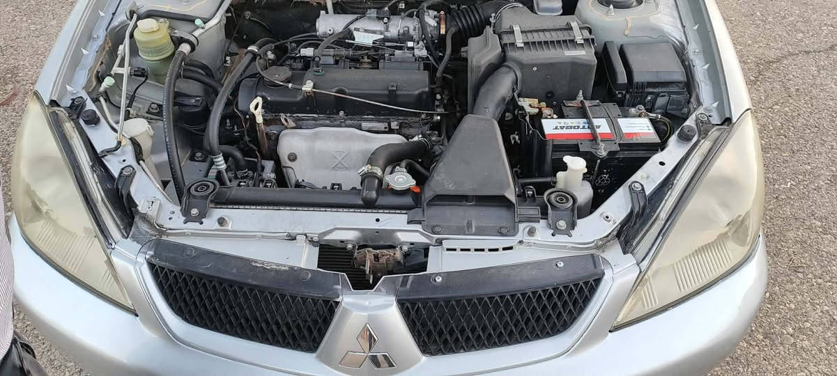 لانسە ر مۆدیل 2009 مە کینە گە ورە ناو فۆرمیکا 3 پارچە بۆیاغ بی ناوگرتن  زۆر خاوینە  گیر مە کینە تە برید بە شە رت سحری 69 ک مە جال ژم *********** كويسينجاك, أربيل
