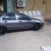 لانسر ٢٠١٠ • مكينة حدادية • بطارية جديدة