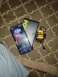 بوكو X7 • كاميرا 50MP • عدسة مكسورة