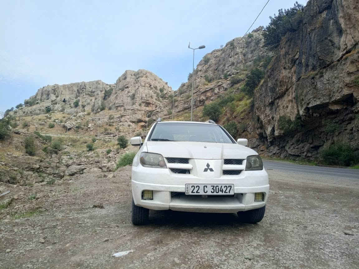 اوتلاندر ٢٠٠٣ • دبل اكسل AWD • اوتوماتيك