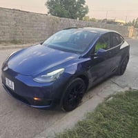 تسلا y 2023 تك ماطور  ماشي ٤٦الف كيلو وليس ميل اون لاين  صبغ بنيد بس و...