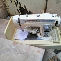 مكينة خياطة • برازر