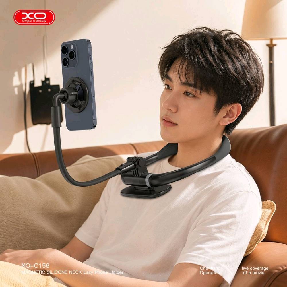 حامل هاتف مغناطيسي XO-C156  مرن يُعلق حول الرقبة (Magnetic Neck Lazy Phone Holder)، وهو مصمم ليوفر لك تجربة استخدام مريحة ومشاهدة ممتعة ومكالمات فيديو دون الحاجة للإمساك بالهاتف بيديك.
ستاند رقبة مغناطيسي xo c156

أبرز مواصفات ومميزات المنتج: 

تثبيت مغناطيسي قوي: يدعم تقنية تشبه MagSafe لتثبيت هواتف الآيفون والأجهزة المتوافقة بقوة وسهولة بمجرد تقريبها، بدون الحاجة لمشابك أو إطارات جانبية.

تصميم مرن ومريح: مصنوع من مادة السيليكون الناعمة وجسم متين من بلاستيك (ABS+PC) لضمان الراحة عند ارتدائه حول الرقبة لفترات طويلة دون تهيج الجلد.

تعديل زاوية الرؤية: يحتوي على ذراع مرن وقابل للتعديل بالإضافة إلى مفصل كروي يتيح لك تدوير الهاتف وتغيير زاوية المشاهدة بحرية كاملة (أفقي أو عمودي).

متعدد الاستخدامات: يمكنك ارتداؤه حول الرقبة أثناء الطهي، القيادة، البث المباشر، أو مشاهدة الأفلام، كما يمكن طيه واستخدامه كحامل (ستاند) ثابت على المكتب أو الطاولة.

توزيع الوزن: يحتوي على دعم صدري مدمج يضمن توزيع وزن الهاتف بشكل متساوٍ لتقليل الإجهاد على الرقبة.
حامل هاتف مغناطيسي XO-C156  مرن يُعلق حول الرقبة (Magnetic Neck Lazy Phone Holder)، وهو مصمم ليوفر لك تجربة استخدام مريحة ومشاهدة ممتعة ومكالمات فيديو دون الحاجة للإمساك بالهاتف بيديك.

السعر:22 الف
التوصيل: 5 لكل العراق