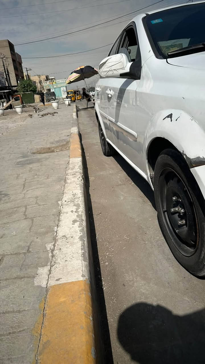 السلام عليكم اوبترا موديل ٢٠١٢سياره جديده خير من الله صدر تخم تاير تبريد كير كله جديد بيها بارد على كد جف الايد بالباب الامامي وبيها الجاملغ مال الصدر بارد موظح بالصور المكينه بيها تنقيص كلش كلش قليل السعر ٧٨ورقع المكان بغداد حي اور ‭***********‬

