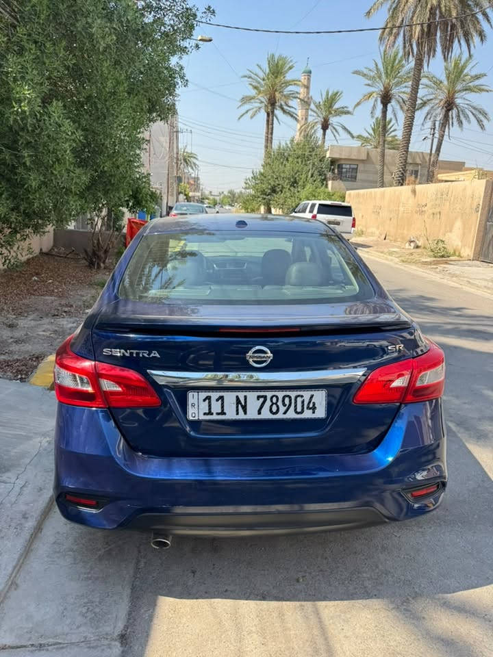 نيسان سنترا
موديل ( SR (2019
اعلى فئة بالسنترا SR
محرك 1800
ماشية ٨١ الف كيلو
وارد امريكي ضربتهه بابتين عكس السائق 
السياره فول مواصفات
بصمة تشغيل ، بصمة بيبان ،سلايد روف ،تحكم ستيرن كشنات كهرباء ،تقنية السبورت ، زينون بلادي ناصي , تدفئة كراسي الامامية ,رادار امامي وجانبي
فقط الجاملغ الخلفي عكس السائق حالياً بية شخط موضح في الصور 
السيارة حره تحويل ثاني يوم
السعر  11.000
مكاني بغداد نفق الشرطة
هاتف ***********
غير متواجد على الفيس

