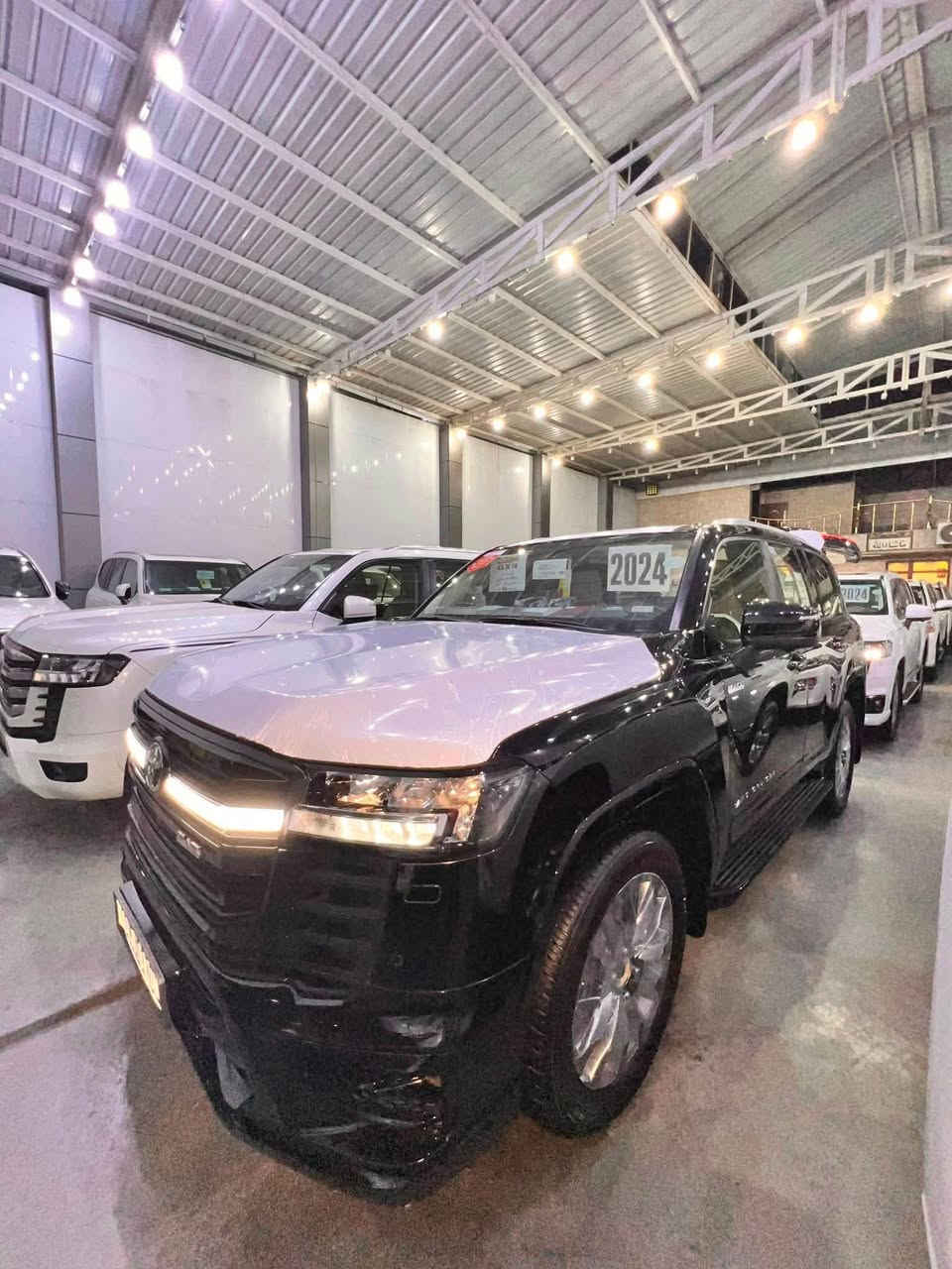 ﷽

� لاندكروز بلاك ادشن 2024 GXR -Limited 
شركة ساز   ام الضمان 
بلاك ادشن اصل مو تلزيك
فول موصفات 
1. فتحه سقف 
2. كامرات 4 
3. رادارات 
4. حساسات 360 درجه 
5. صندوق كهرباء 
6. شاشات عدد 3 
7. كشنات كهرباء 
8. شاحن لاسلكي 
9. ثلاجه 
10. نظام فور ويل 
11. كشنات تبريد 
12. محرك 6 سلندر 4000 تنفس طبيعي 
13. جديدة وحلوه ومال جناي 
14. رقم بغداد مميز باسمي تحويل مباشر 
15. كفاله عامة من جميع النواحي 
16. بعدها بحالة الوكالة 
• نظام تحكم منفصل بالتبريد للمقاعد الخلفية
 • شاشة وسطية كبيرة ونظام صوت فاخر
 • فتحات USB، بلوتوث، أنظمة أمان حديثة

السيارة  ختم بلاك بكل مكان                         

مغلفه PPF للبيع او مراوس 

السعر اتصل 

لاستفسار الاتصال ع الارقام التالية 📲📲

*********** // *********** ‏

تحياتي لجميع
