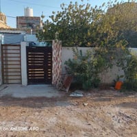 بيت يحتوي على غرفتين وصاله ومطبخ واستقبال+مشتمل يحتوي على غرفه ومطبخ ا...