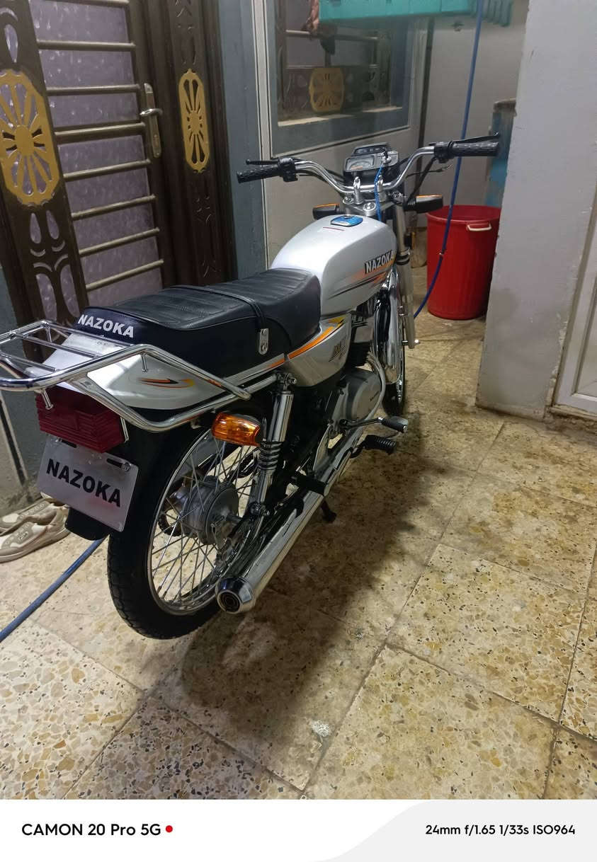 سوزوكي • AX100 • كفاله