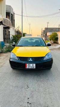 لانسر ٢٠٠٩ • رقم ديالى • سنوية ٢٠٣٠