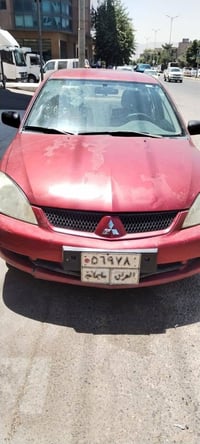 لانسر • ٢٠٠٧ • يد واحدة