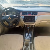 شباب لانسر شركة عامه موديل 2010 بيها صبغ عام بدون ضربه قويه بدون تبديل...