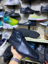 احذية • ترانشوز • جلد