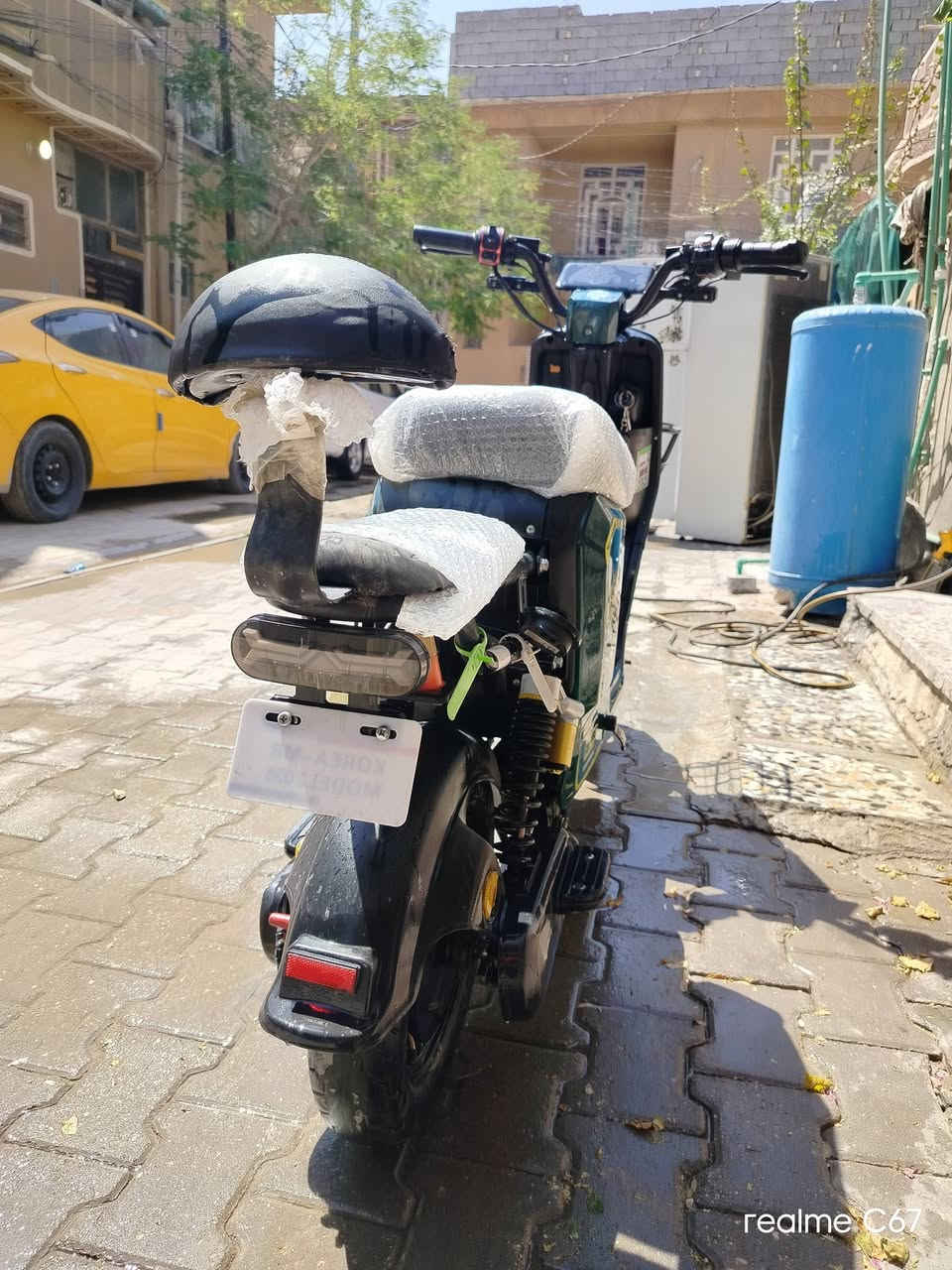 السلام عليكم دراجه شحن r 8 للبيع نسخه الكوريه الدراجه نضيفه بطاريات 5 ونلي الكبار 22 امبير الدراجه اي خلل مابيه كامله تمشي 30 كيلو او اكثر بل شحنه الوحده سرعه 60 حقيقي ملحقات كامله شاحنه صار اسبوع من مشتريه بصمه وسويجين وكارت السعر 425 وبيه مجال  العنوان كربلاء الجاير قرب اسواق برتقاله للاستفسار ***********

نص مكتوب في الصور:
- realme C67