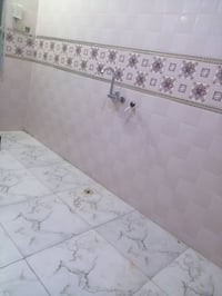 بيت للايجار • ١٠٠م • نجف شارع المطار