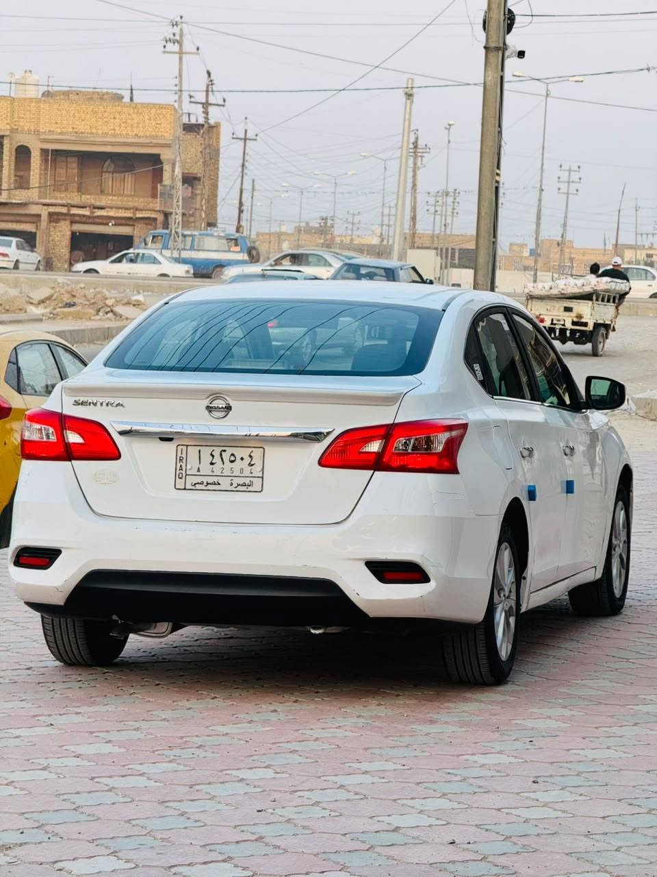 السلام عليكم ورحمة الله  نيسان سنترا موديل 2019  وارد أمريكي  حادثه جانبي تبديل ابواب اصليات  بجم كبس الشركه حادثه مرفق مع النشر السياره  جاهزة  وجديده استخدام شخصي محرك 1800 كفاله كير تخم تاير صار اسبوع جديد  مواصفات نص فول حره تحويل  ثاني يوم السعر 95 وبيه مجال للشراي العنوان ناصريه مركز المدينه قرب مطعم الحوراء  موبايل ***********
