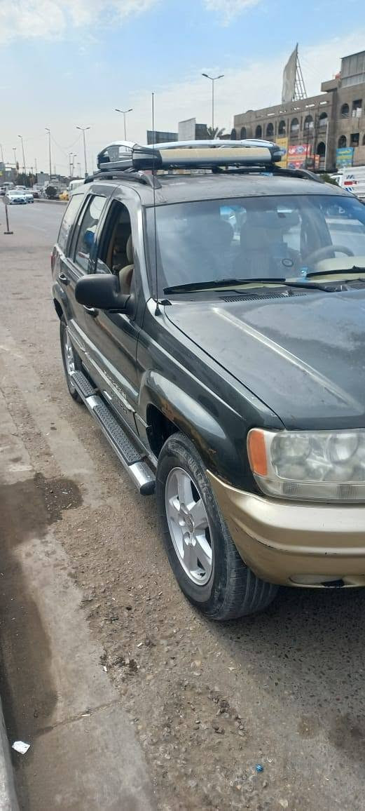جيب شيروكي صلاح الدين بأسمي للبيع موديل 2000 بچم محدث 2004 مكينه 3000 في في تي ياباني جاهزه گير ومحرك وتدفئه وتبريد ثلج كهربائيات كامله منظومه سماعات وشاشه جديده كامله داخليه نظيفه السنويه منتهيه تخم تاير باتري جديد تحويل مباشر السعر 50 وبي مجال بسيط او للماروس حسب القناعه المكان بغداد سبع البور متواجد فيس او على الرقم ‏‪***********‬‏

