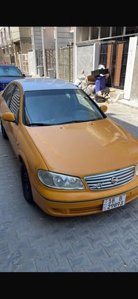 نيسان صني ٢٠٠٢ بدون حادث رقم بابل الجديد خصوصي اللون اصفر ملون بغداد ا...