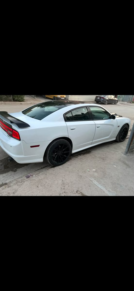 جارجر موديل 2014 محدثه رياضيSRT كلين مواصفات عاديه مكاني بغداد الشعب السعر 145 رقمي ***********
