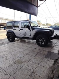 للبيع او المراوس ارخص جيب رانغلر ٢٠١٦  صحارى سبورت رقم بغداد باسمي هزه...
