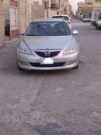زوم 6 • ٢٠٠٣ • بدون صبغ