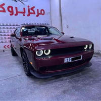 دوج جالنجر 2021 لون كرزي  رقم بغداد الجديد ب اسمي مكينة 3.6 قطعتين صبغ...