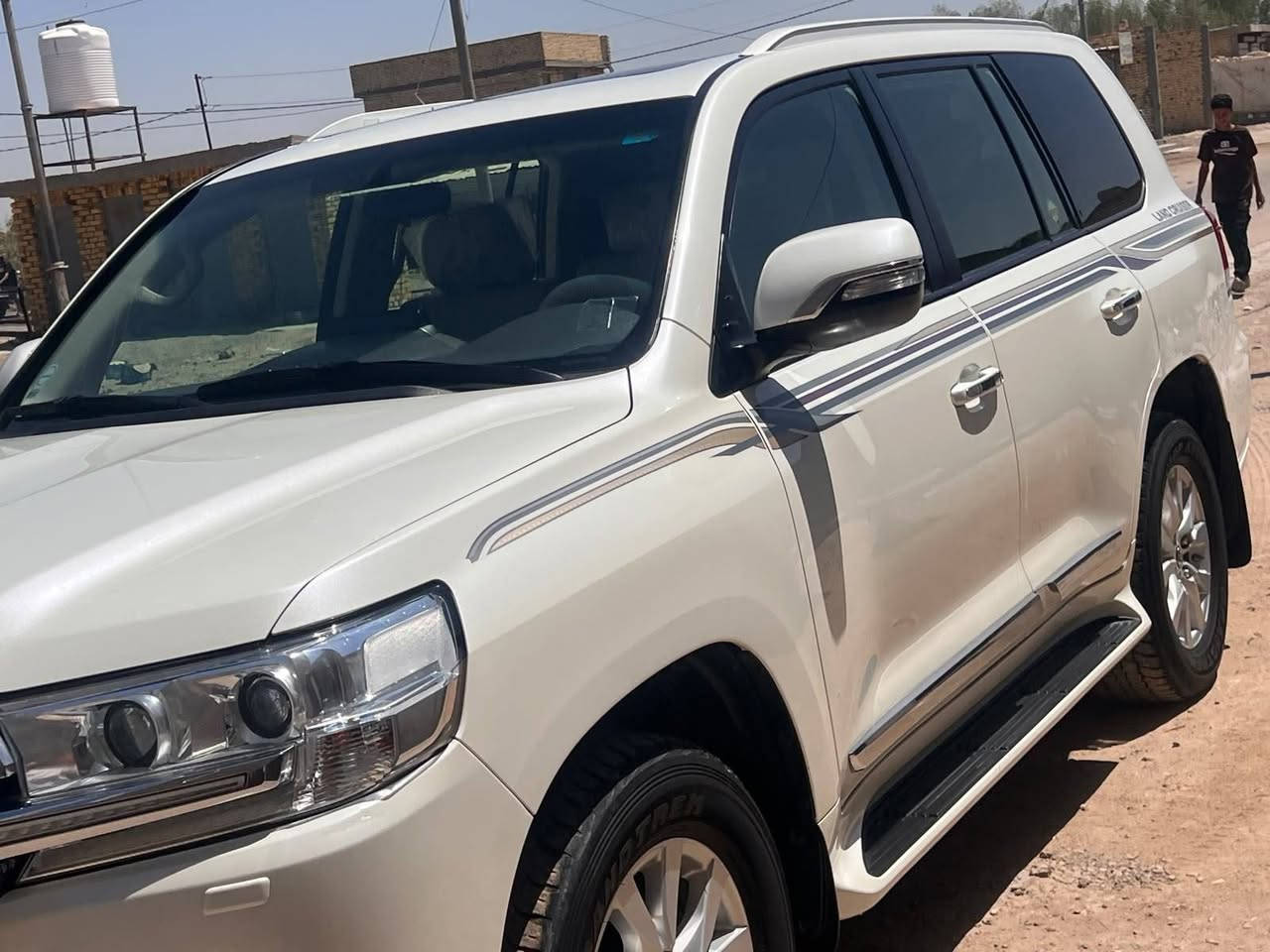 ‏🚘 للبيع | تۆیۆتا لاندکروزر 2018 | Toyota Land Cruiser 2018
‏* تويوتا لاندكروزر 2018 بريم / رقم بغداد
‏* SAS باب أول – White Edition
‏* فل كامل (1/1)
‏* محرك 4000 
‏* رادار أمامي
‏* شبك أبيض ونيكل
‏* لايت تحت الدوسة
‏* دبل ماوس
‏* شحن لاسلكي
‏* لايت أسود (Black Edition)
‏* فتحة سقف
‏* بصمة تشغيل
‏* كشاف خلفي
‏* حساسات أمامية وخلفية
‏* أوتو لايت
‏* 8 Airbags
‏* كرسيان كهرباء جلد أصلي
‏* تكاية خلفية مع حامل أكواب وقاصة (Cool Box)
‏* تشغيل عن بُعد
‏* تحكمات ستيرن
‏* مثبت سرعة (Cruise Control)
‏* شاشة كبيرة تدعم Android Auto & Apple CarPlay
‏* مرآة داخلية تعتيم أوتوماتيكي
‏* لايت زينون LED
‏* باقي مواصفات الـ White Edition الفل معروفة
‏
‏* المحرك والگير على وضع الشركة 
‏* تايرات جديدة.
‏* السيارة مكفولة والسونار مرفق
‏* الهزة والسنوية مجددات.
‏* تحويل ثاني يوم. العنوان/ الحله الحمزه الغربي
‏السعر     50000$      وبي مجال قليل
‏الاستفسار /  ***********  
اتصل مكلف بالنشر 
‏
