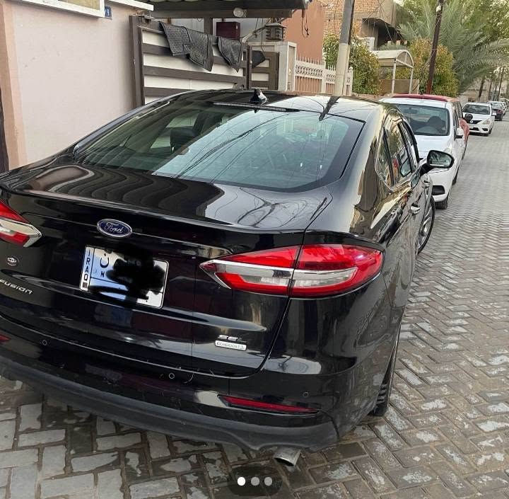 فورد فيوجن موديل 19 كير ومحرك مكفولات تبريد ثلج امامي وخلفي تشتغل بنزين عادي ماكو اي دوانس محرك 1500 توربو داخل جلد السيارة حادثها امريكا شطحي البنيد بدون لغد اوتكمه اوشواصي  البيع شرط التحويل مكانها بغداد زيونه السعر 90 ورقه للاستفسار اكثر *********** واتس اب
