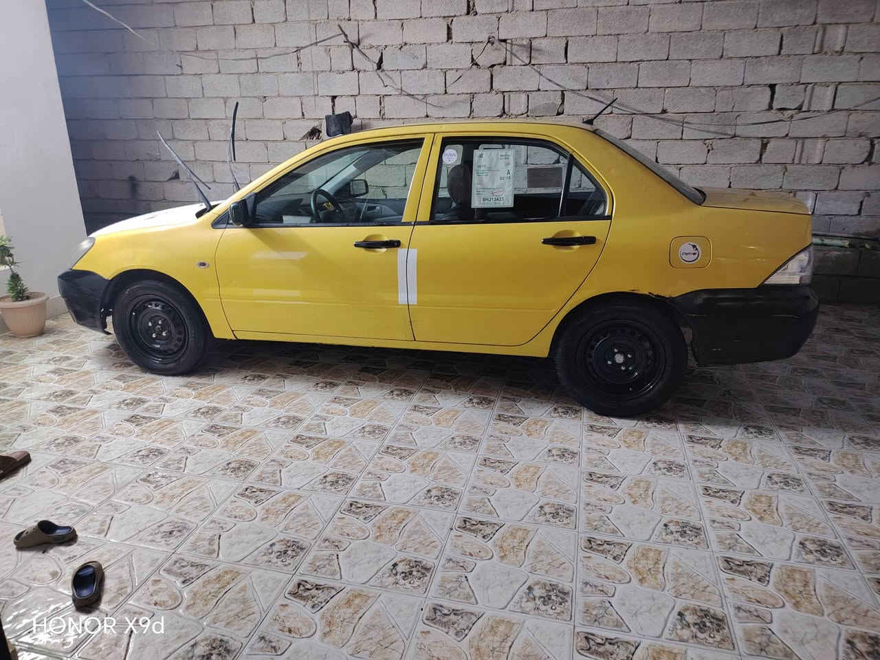 لانسر ٢٠١٠ • رقم بغداد • كير ومكينة مكفولة