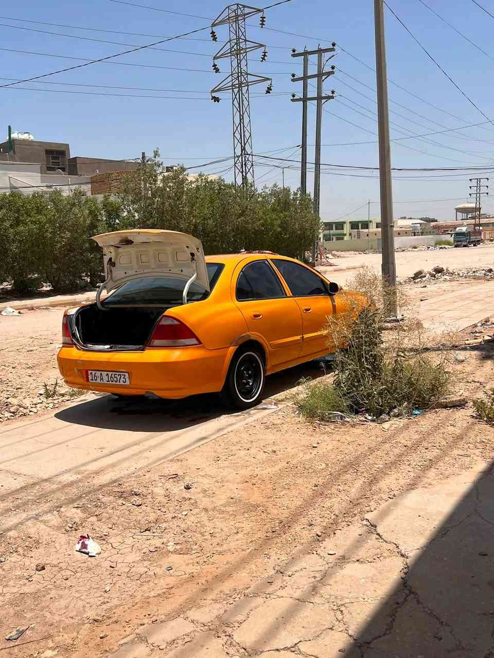 سلام عليكم نيسان صني مديل ٢٠١٢  بسمي رقم نكليزي مصفره هيه وغرامات تبريد ثلج منضومه جديده بيه جاملغ امامي مبدل بس وتلكيطات سعر ٧٥ رقم ***********  مكاني دوانيه حي الجزئر
