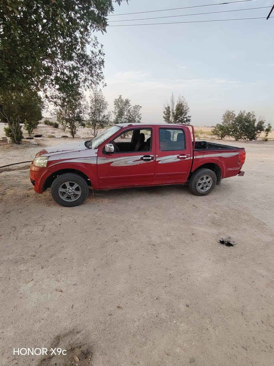 گريت ويل 13سياره كفاله گير محرك حداديه تايرات ڱڵـه  جديد ماشيه 190الف رقم ذي قار تبريد شغال كهربايات المكان البصره زبير السعر 55بيه مجال ***********

نص مكتوب في الصور:
- HONOR X9c