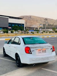 أوبترا ٢٠١٢ • أبيض • رقم بغداد