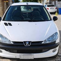 ٢٠٦ سيدان • گير عادي • رقم بغداد