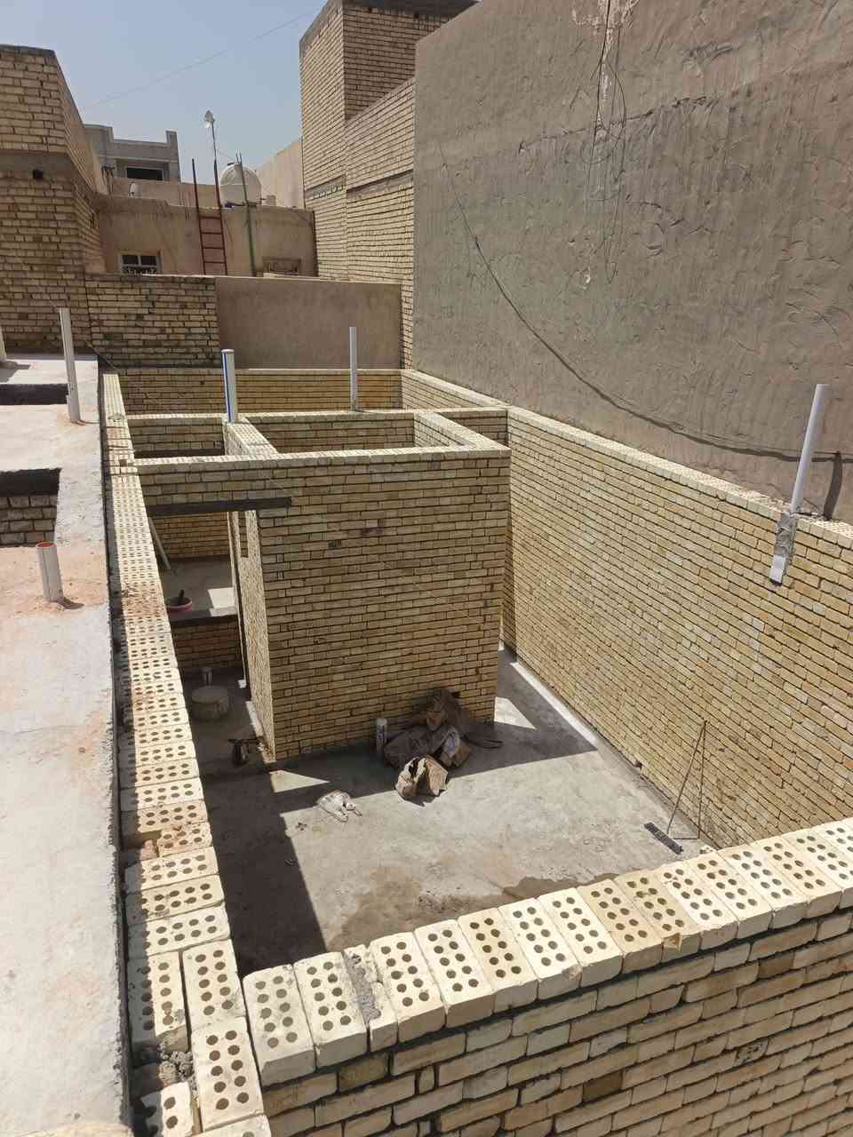 خلفه بناء متفرق في بغداد الأصل ***********
