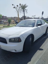 جارجر 2010 بيها جاملغ امامي وبنيد وباب خلفي  صبغ رقمها دولي الجديد بأس...