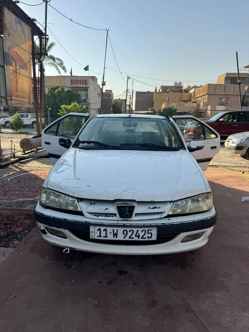 سيارة بيجو بارص موديل 2012 خصوصي بيضاء مكينة كهربائيات كامله تبريد شغال ثلج ضربتها صندوق ماواصل للشاصي بنيد مبدل سنويه 2027بأسمي عليها غرامات 600الف رقم صاحب السياره *********** 
السعر 30$
