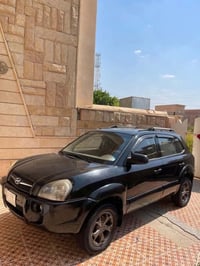 توسان ٢٠٠٩ • محرك ٢٠٠٠ • رقم صلاح الدين