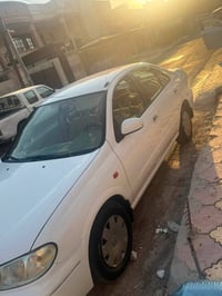 نيسان صني • ٢٠٠٩ • مكفولة من صبغ