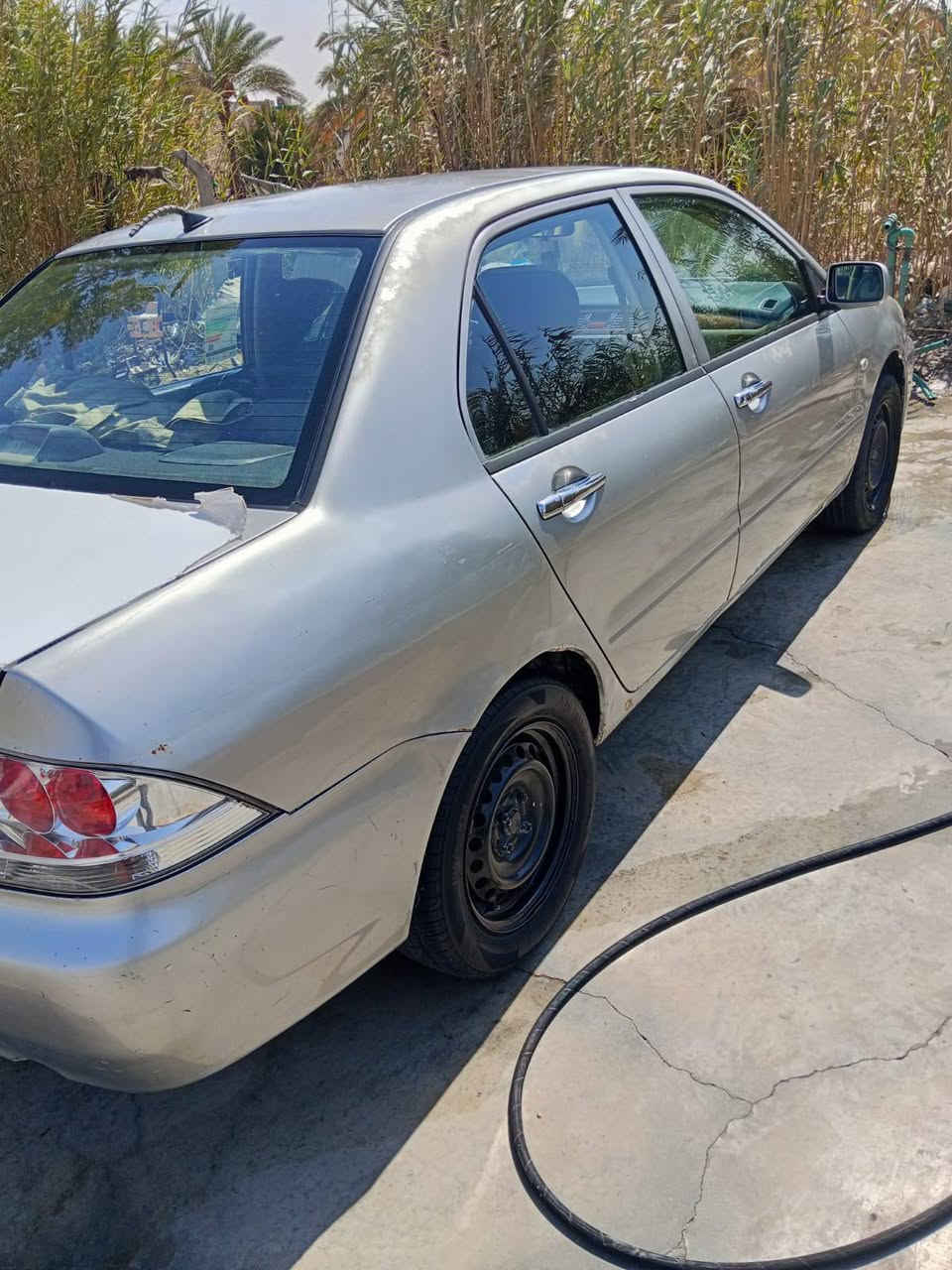 لانسر 10 مكفوله من الضربه والتبديل مكينه وكير خير من الله بيها جراد قليل السعر 75 وبيها مجال بسيط مكان السياره القادسيه الحمزه الشرقي  ***********
