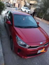 عندي ريو حمرة بغداد موديل ٢٠٢٠ سنويه باسمي بعد كم شهر تصير حره للبيع ٩...