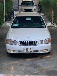 أوبتيما 2005 ..... وفود...🫠 لون أبيض لؤلؤي..  سياره جديده شكد متتوقع و...