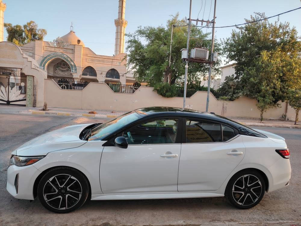 نيسان سنترا 2024 SR وارد أمريكي 
• لون أبيض صدفي - سقف اسود 
• فئة SR
• ماشية 35,000 كم
• محرك 2.0 لتر
• شاشة وسطية + Apple CarPlay وAndroid Auto
• تشغيل بصمة + دخول ذكي
• كاميرا خلفية
• مثبت سرعة
• تحكم بالمقود
• ويل ألمنيوم قياس 18
• داخلية رياضية ومقاعد مريحة
• السيارة كاملة وجاهزة من كل النواحي
• يوجد رصعة صغيرة بالباب الخلفي جهة عكس السائق، غير مذكورة بورقة السونار فقط وباقي التفاصيل كلها مذكورة 
• صور الحادث + صورة رقم الشاصي + صورة ورقة السونار مرفقة بالمنشور 📸
عنوان السيارة كركوك حي الخضراء 
رقم / ***********
السعر 165 وبيها مجال كركوك, العراق
