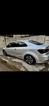 للبيع فورتي 2014 كوبي تك باب رقم بغداد الجديد هزه جديده سنويه باسمي مح...